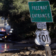 A mud-covered Highway 101 sign after rain and catastrophic debris flows hit California in January.